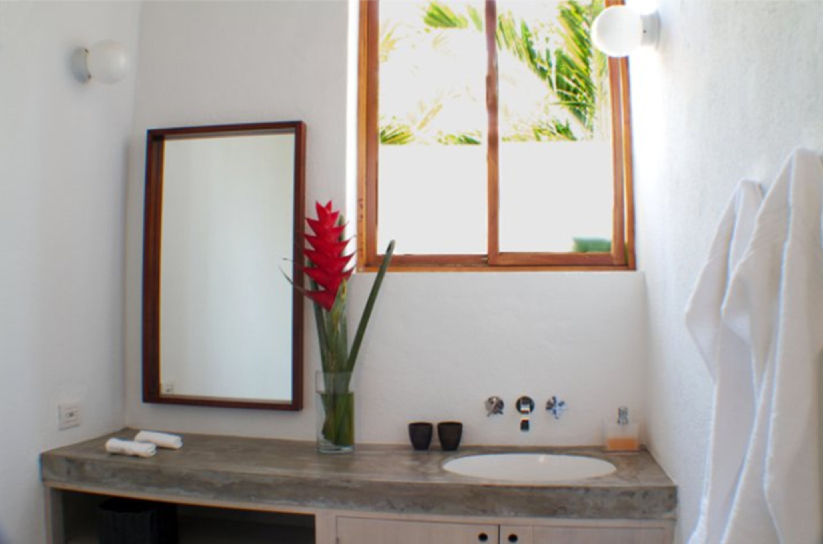 separate bathtub and shower, rainfall showerhead, designer toiletries