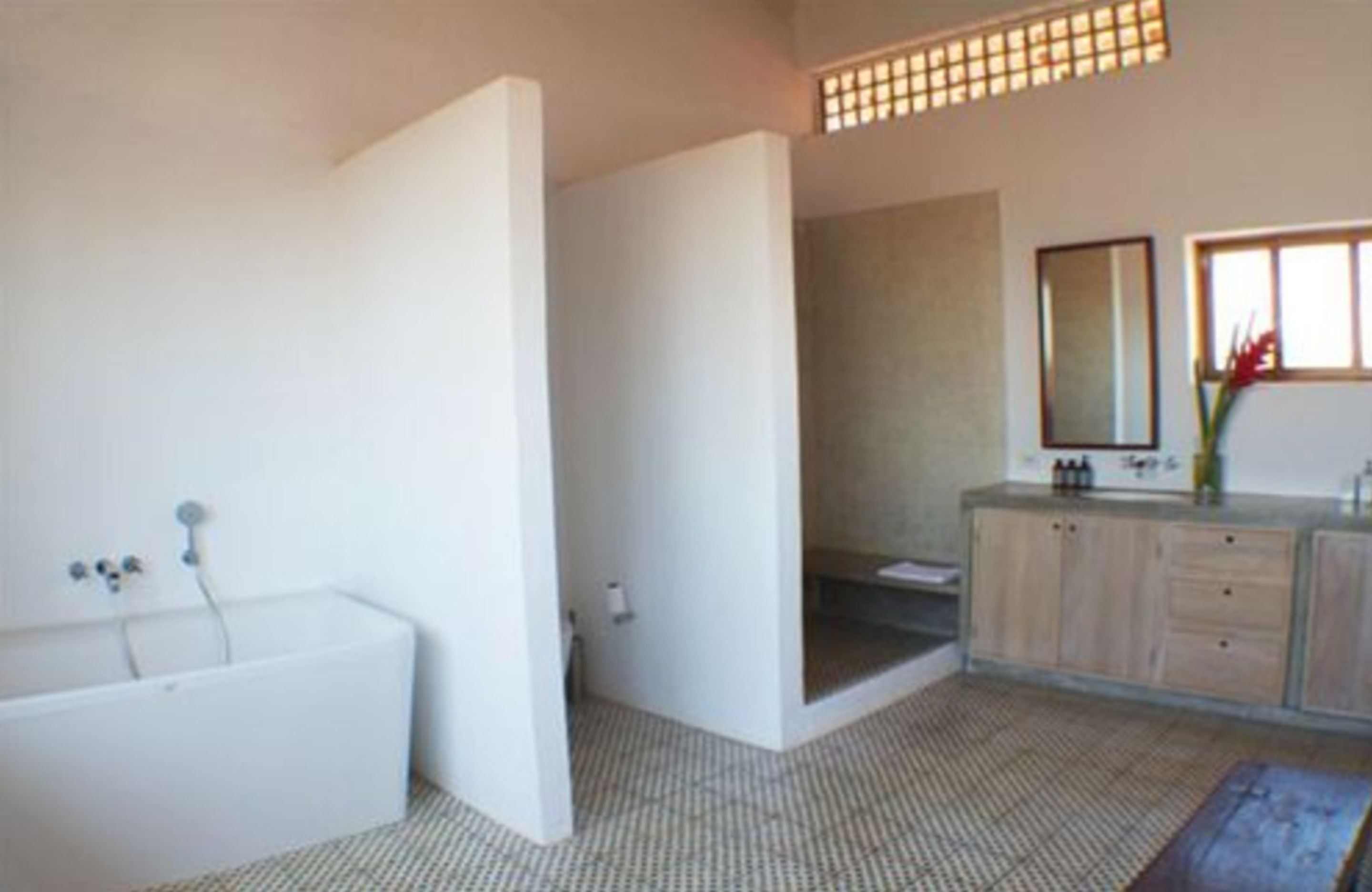 suite, 1 king bed, balcony | bathroom | separate bathtub and shower, rainfall showerhead, designer toiletries