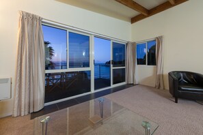 Malindi Beach, 2 bedrooms and 1 bathroom Apartment | Living room | 34-inch flat-screen TV with satellite channels, TV, DVD player - By the Bay Beachfront Apartments (Coopers Beach)