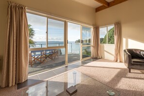 Malindi Beach, 2 bedrooms and 1 bathroom Apartment | Living room | 34-inch flat-screen TV with satellite channels, TV, DVD player - By the Bay Beachfront Apartments (Coopers Beach)