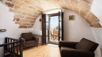 Suite junior | Zona de estar | Una televisión de pantalla plana