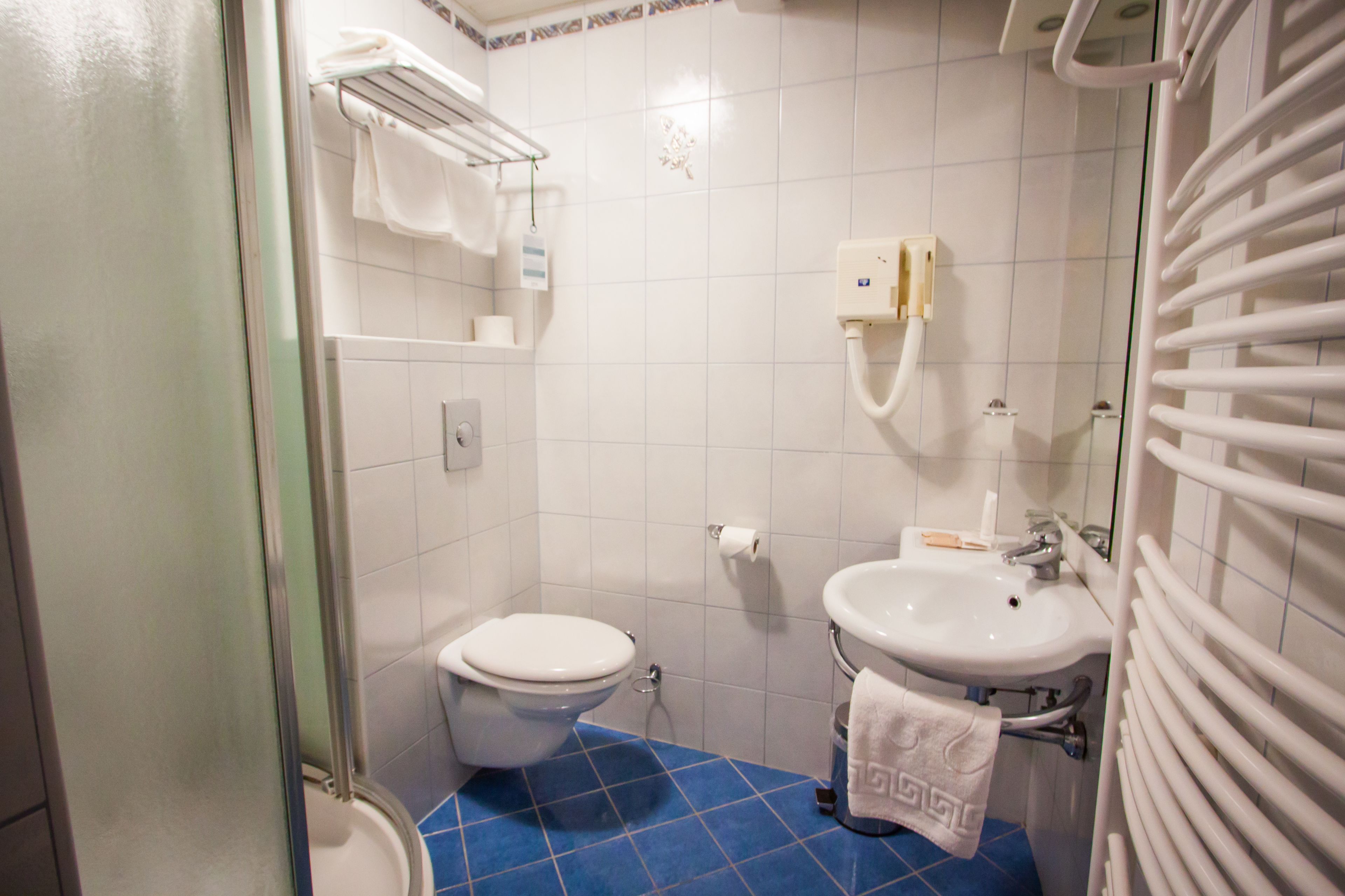 shower, free toiletries, hair dryer, slippers