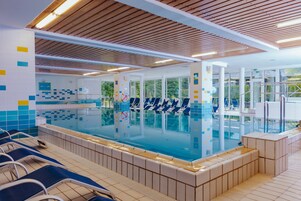 Indoor pool, open 9 AM to 7 PM, sun loungers