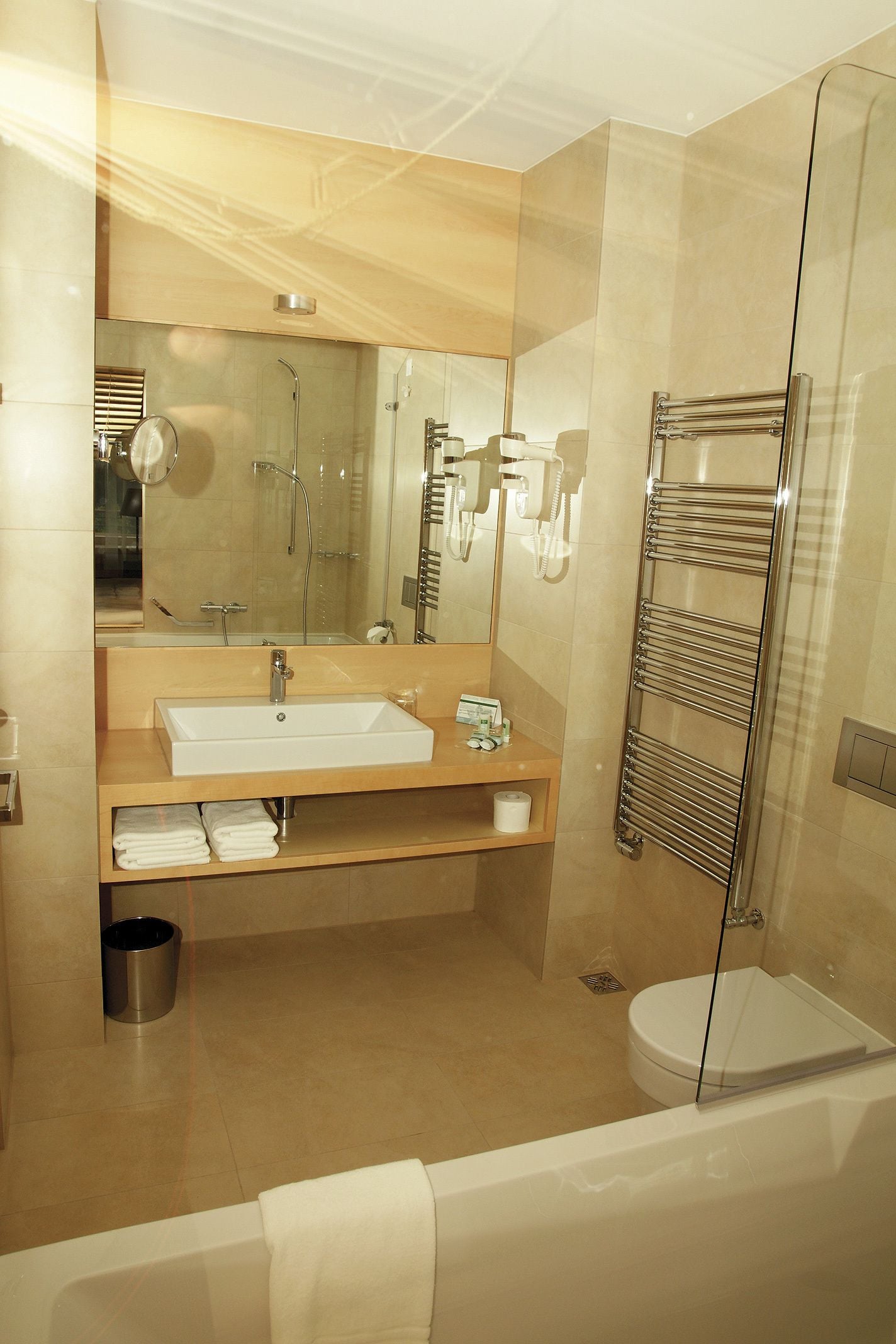 rainfall showerhead, designer toiletries, hair dryer, bathrobes