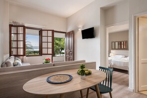 Apartment, 1 Bedroom, Sea View (Side) | Living room | 28-inch LCD TV with satellite channels, TV - Alianthos Suites (Chania)