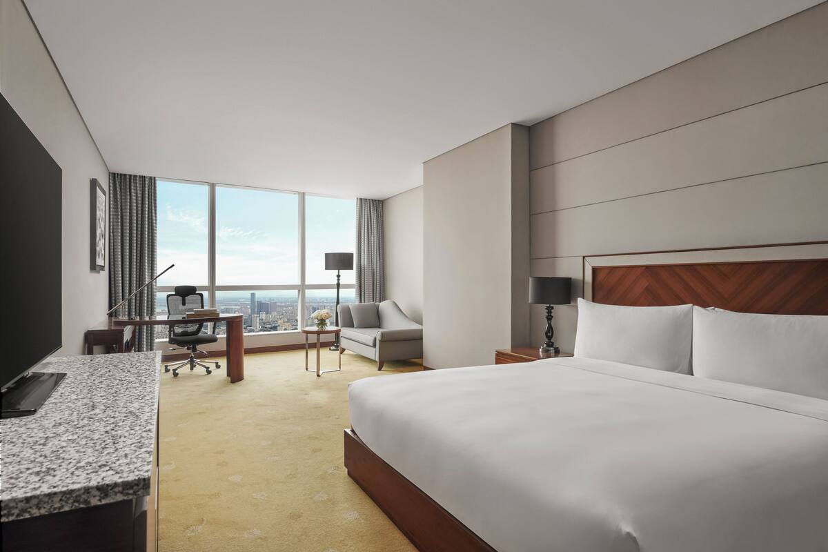 1 phòng ngủ, bộ đồ giường cao cấp, nệm có lớp đệm bông, minibar 