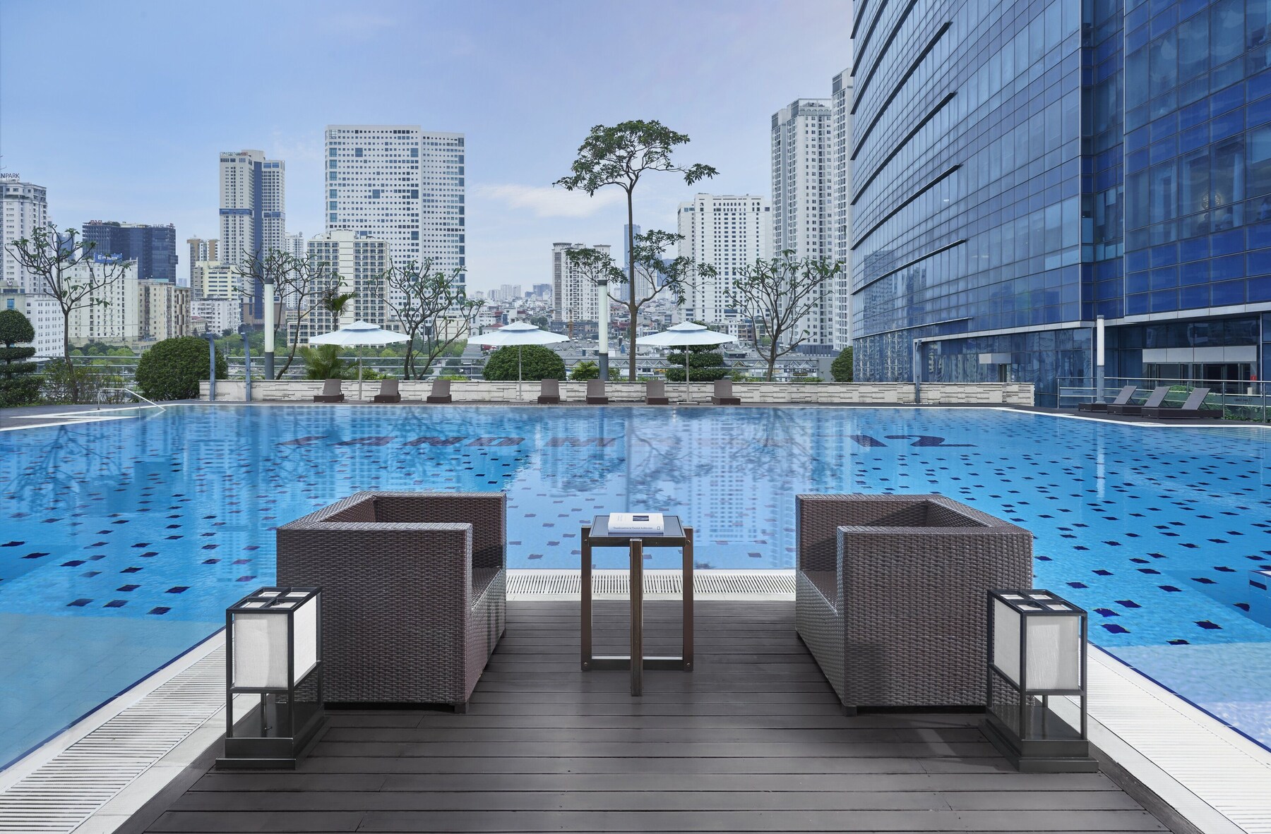 Outdoor pool, open 6 AM to 9:30 PM, pool umbrellas, pool loungers