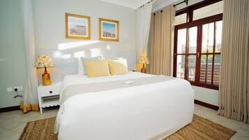 Deluxe Room | Premium bedding, minibar, in-room safe, desk