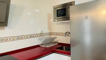 City Apartment, 1 Bedroom, Kitchen, Annex Building | Bathroom | Shower, hair dryer, towels