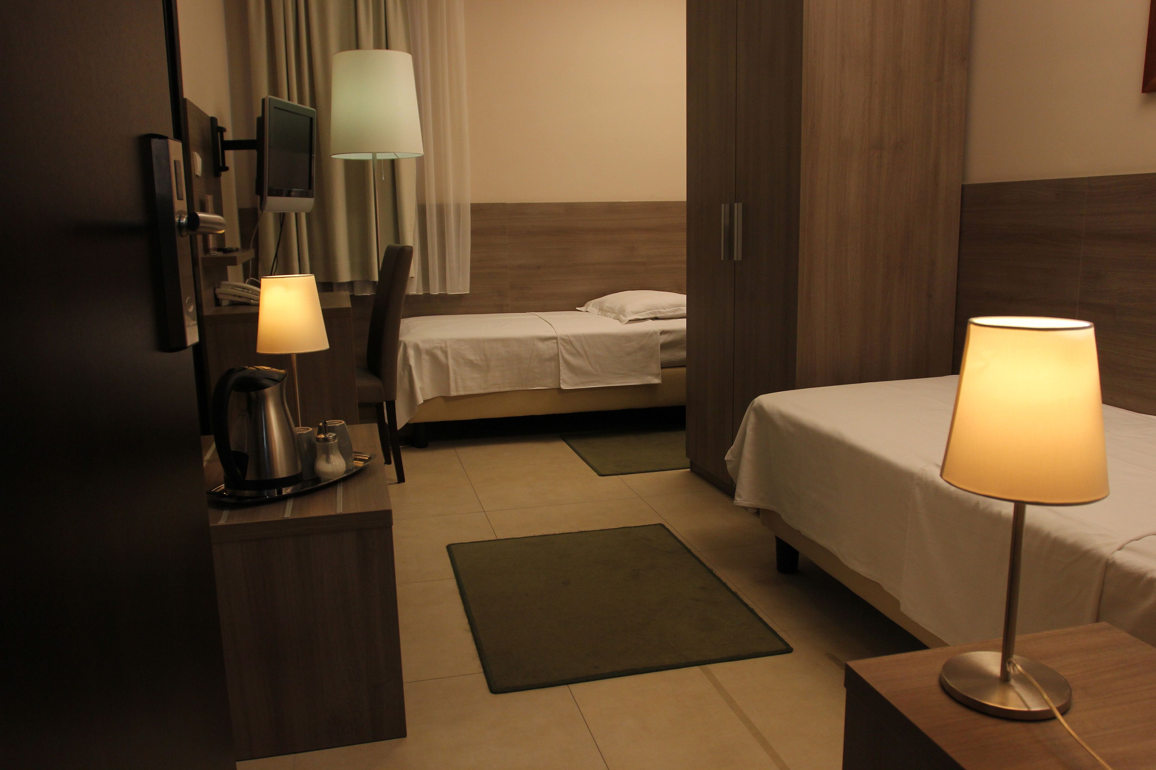 twin room, 2 single beds | minibar, in-room safe, individually decorated, individually furnished