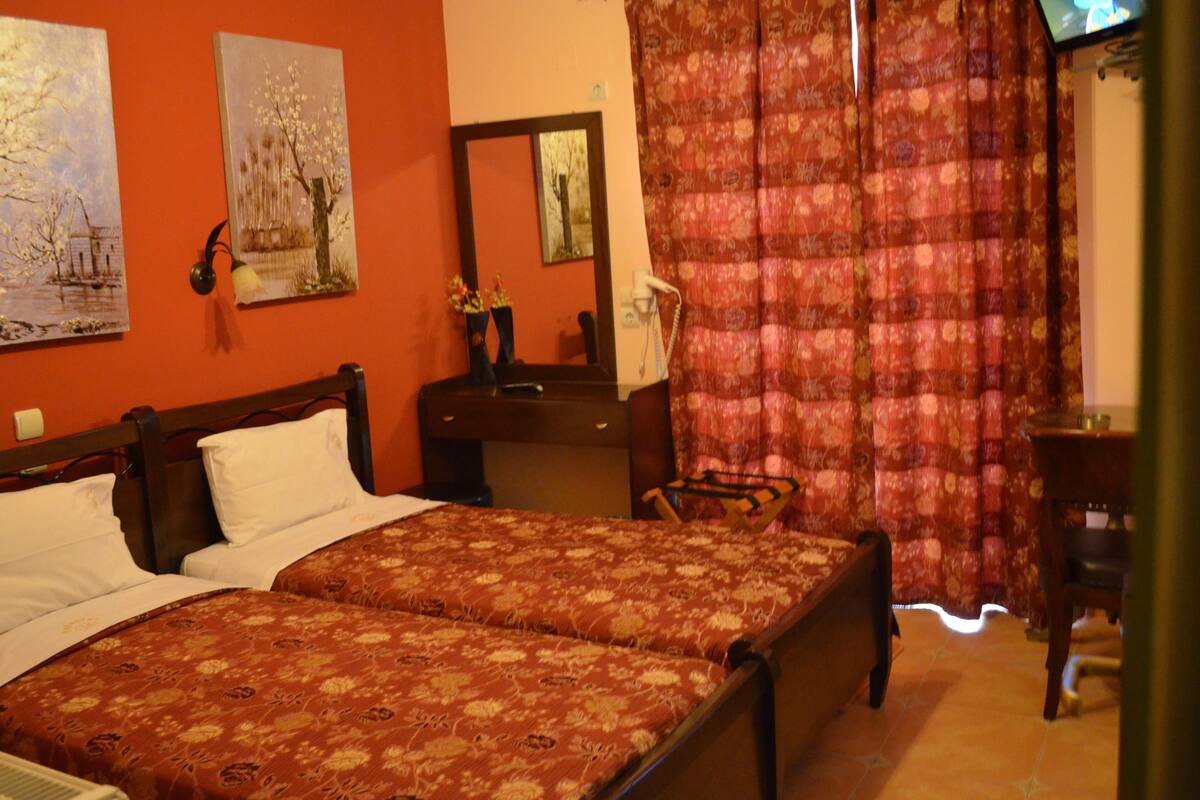 Double or Twin Room, Partial Sea View | In-room safe, desk, free WiFi