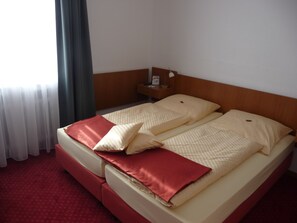 Luxe beddengoed, een kluis op de kamer, individueel gemeubileerd