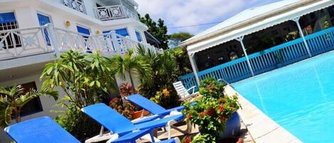 Outdoor pool, pool umbrellas, pool loungers