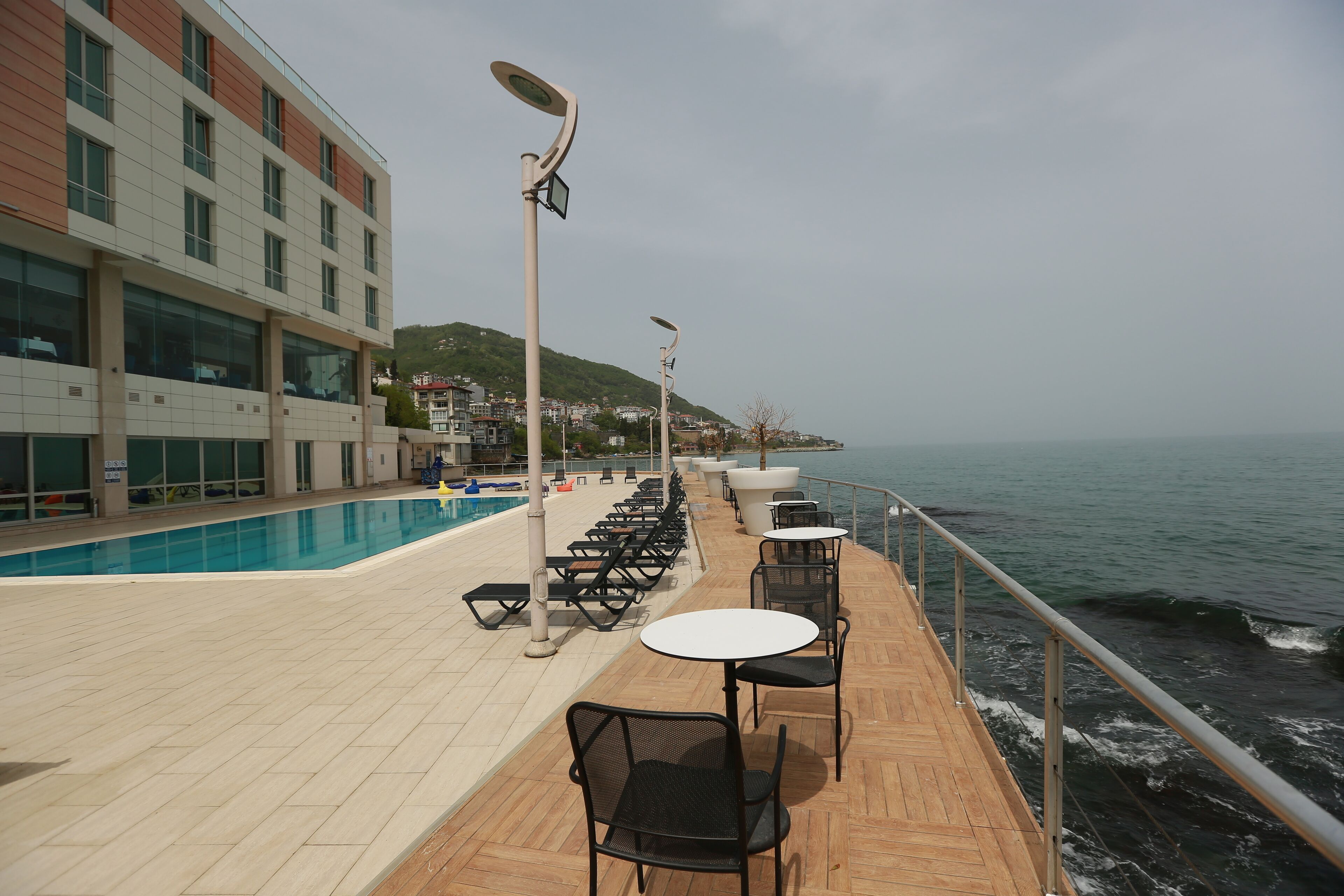 seasonal outdoor pool, pool umbrellas, pool loungers