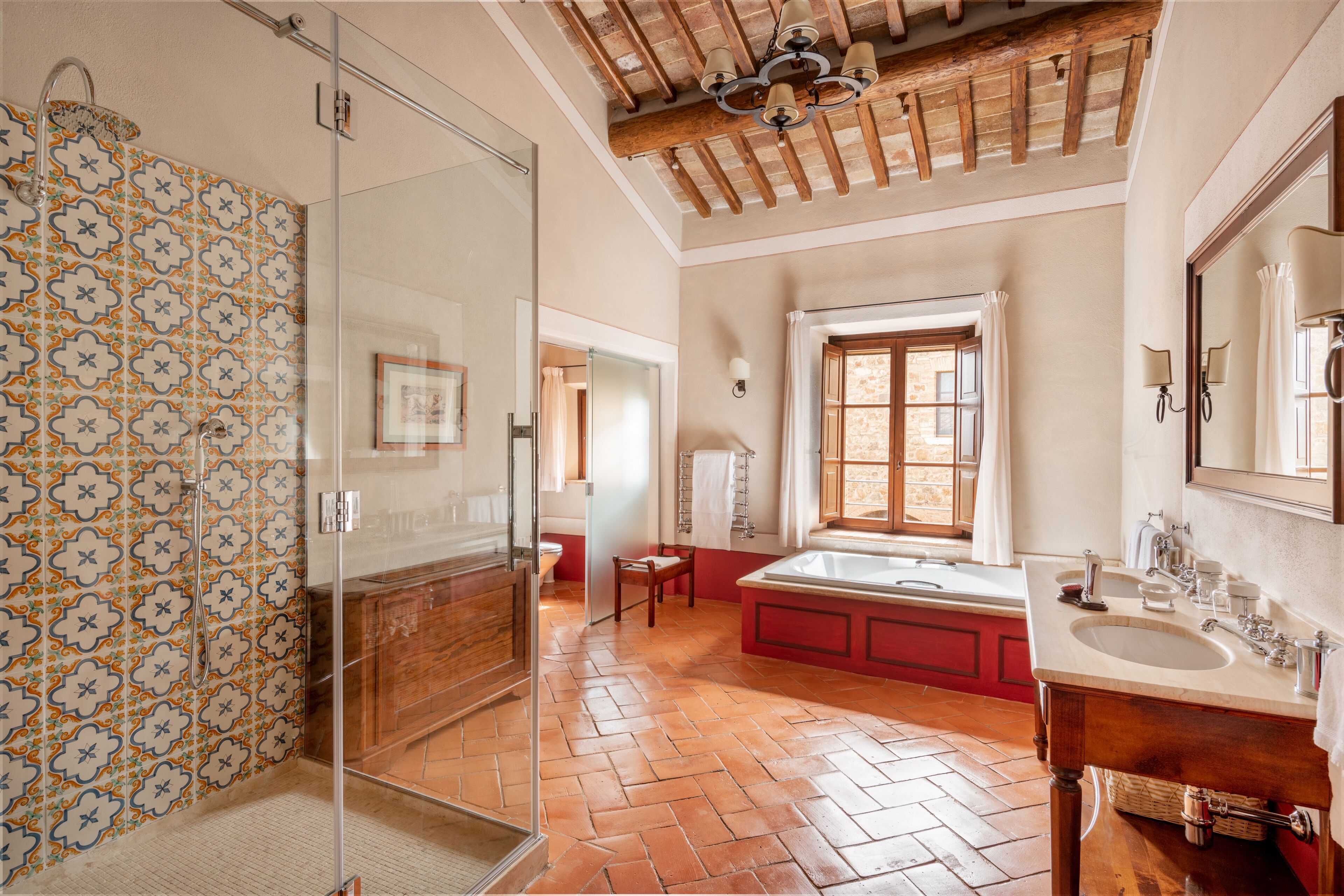 junior suite | bathroom | shower, rainfall showerhead, hair dryer, bathrobes