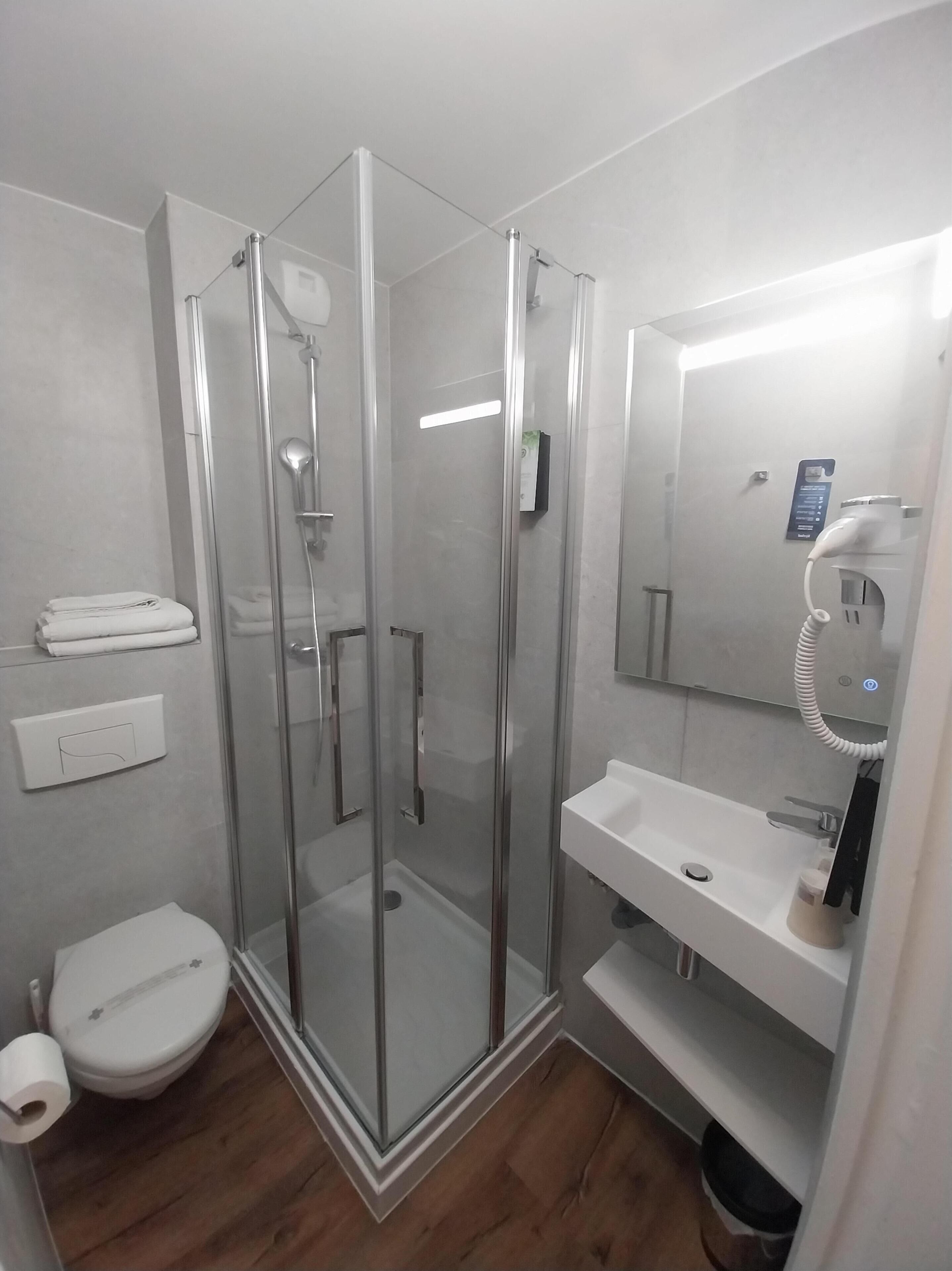 shower, rainfall showerhead, eco-friendly toiletries, hair dryer