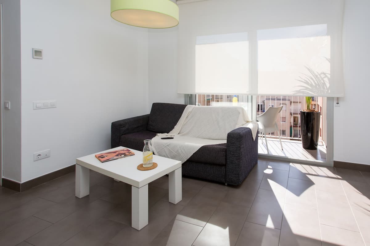 Standard Apartment, 1 Bedroom, Balcony (1-2 pax) | Living room | 32-inch LCD TV with satellite channels, TV