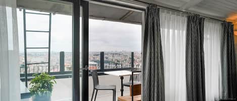 Suite junior | Zona de estar | Una televisión LCD