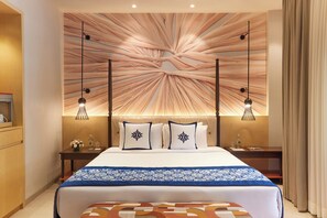 Colchones con pillow-top, minibar y caja de seguridad en la habitación 