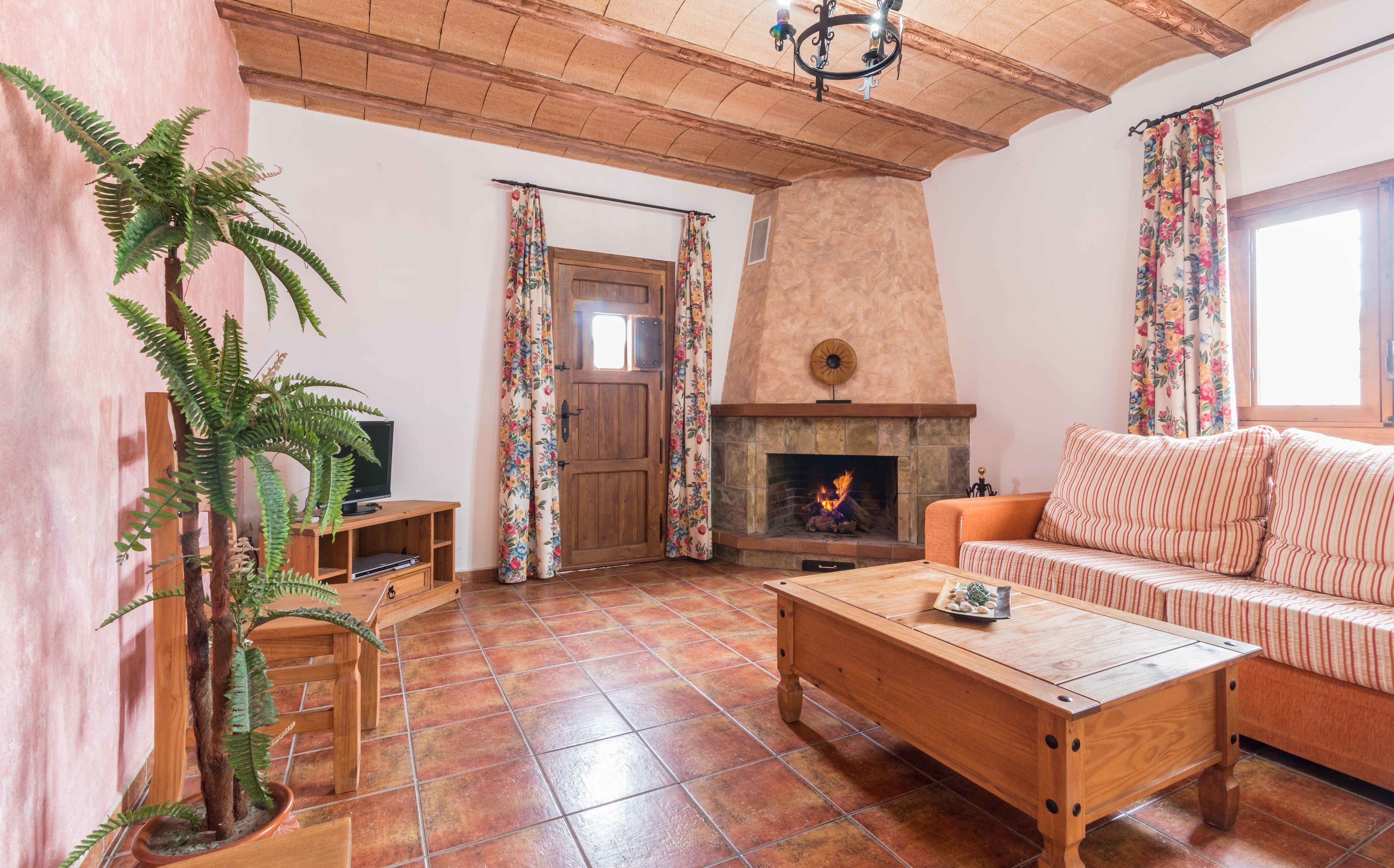 Comfort appartement | Woonruimte | Televisie en een open haard