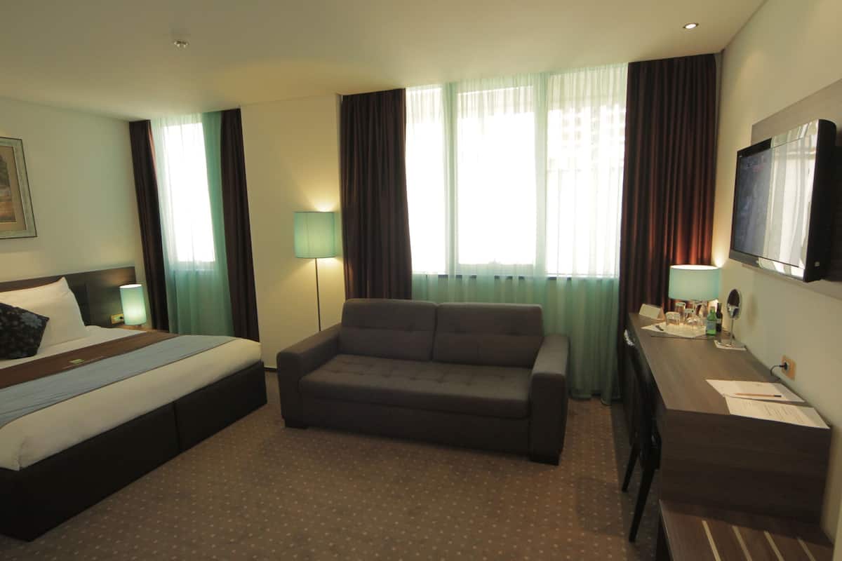 Premium bedding, pillow-top beds, minibar, in-room safe