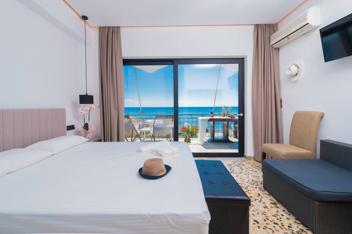 Deluxe Double Room, Sea View | Premium bedding, minibar, in-room safe, individually decorated