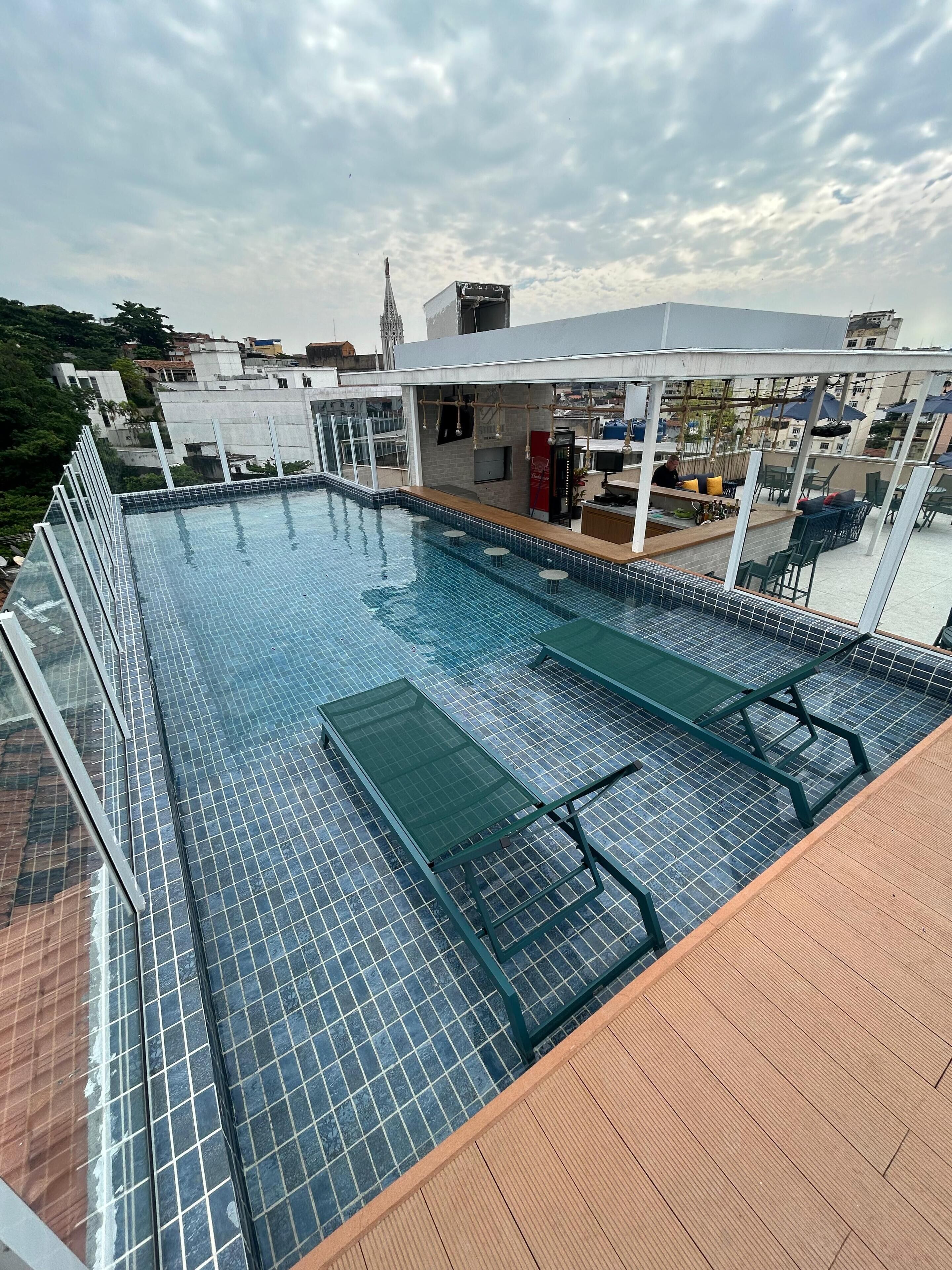 outdoor pool, pool umbrellas, pool loungers