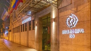 The exterior of Arosario Rio Hotel with a prominent sign and a glass entrance. - Arosa Rio Hotel (Rio de Janeiro)