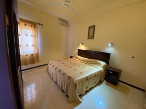 Comfort Apartment, Kitchenette | In-room safe, iron/ironing board, free WiFi