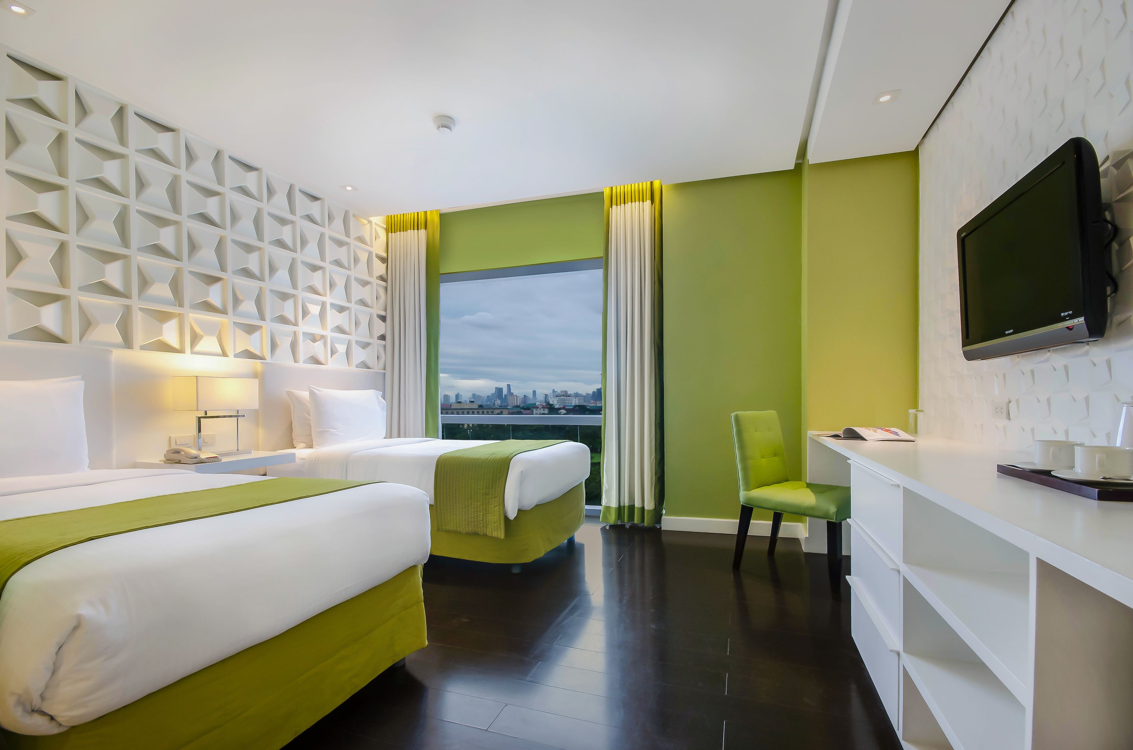 deluxe twin room | premium bedding, minibar, in-room safe, individually decorated