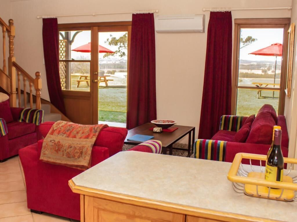 2 Bedroom Lodge | Living area | 35-inch plasma TV with digital channels, TV, fireplace