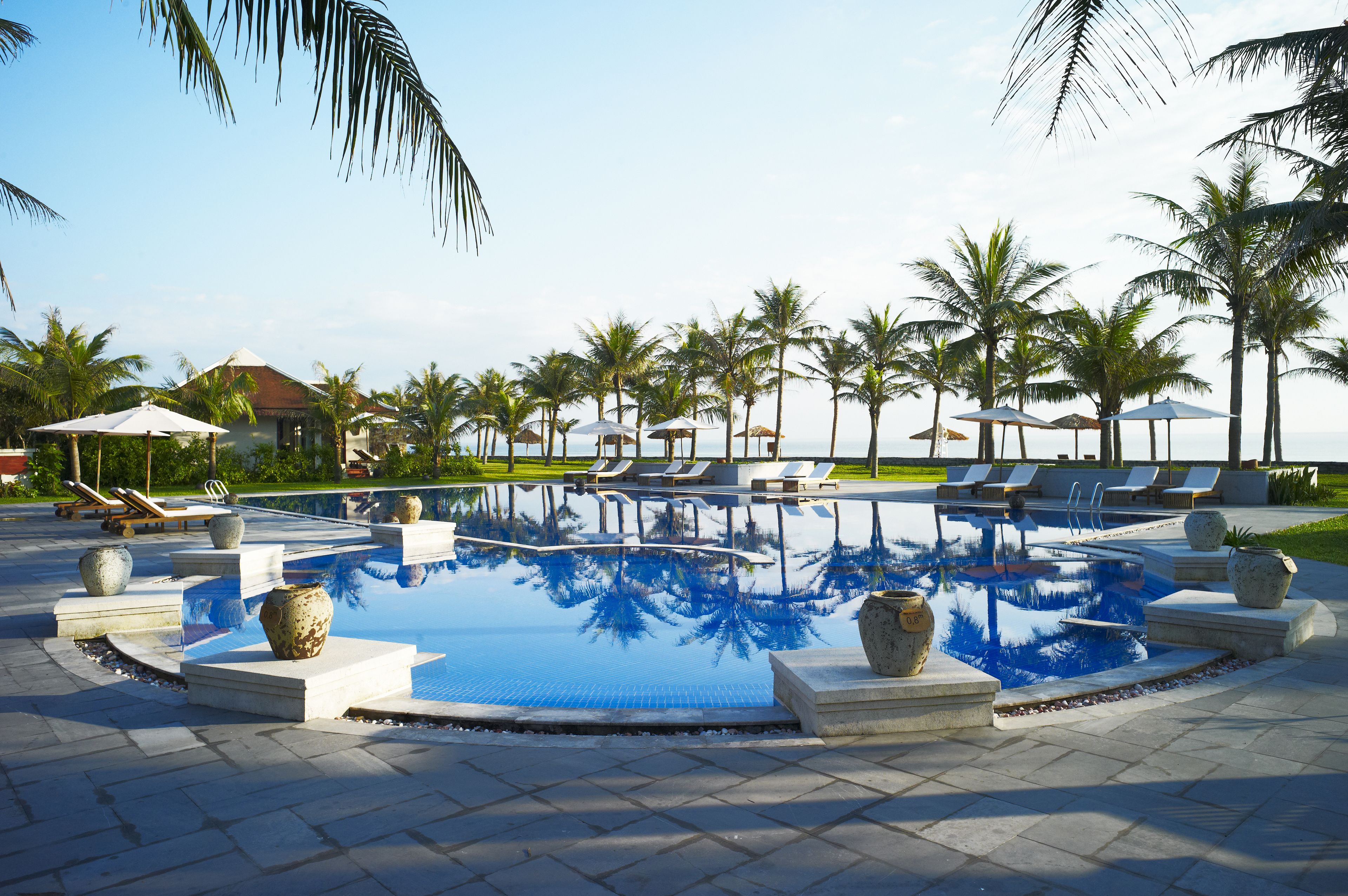 outdoor pool, pool umbrellas, pool loungers