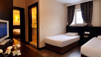 Minibar, iron/ironing board, alarm clocks