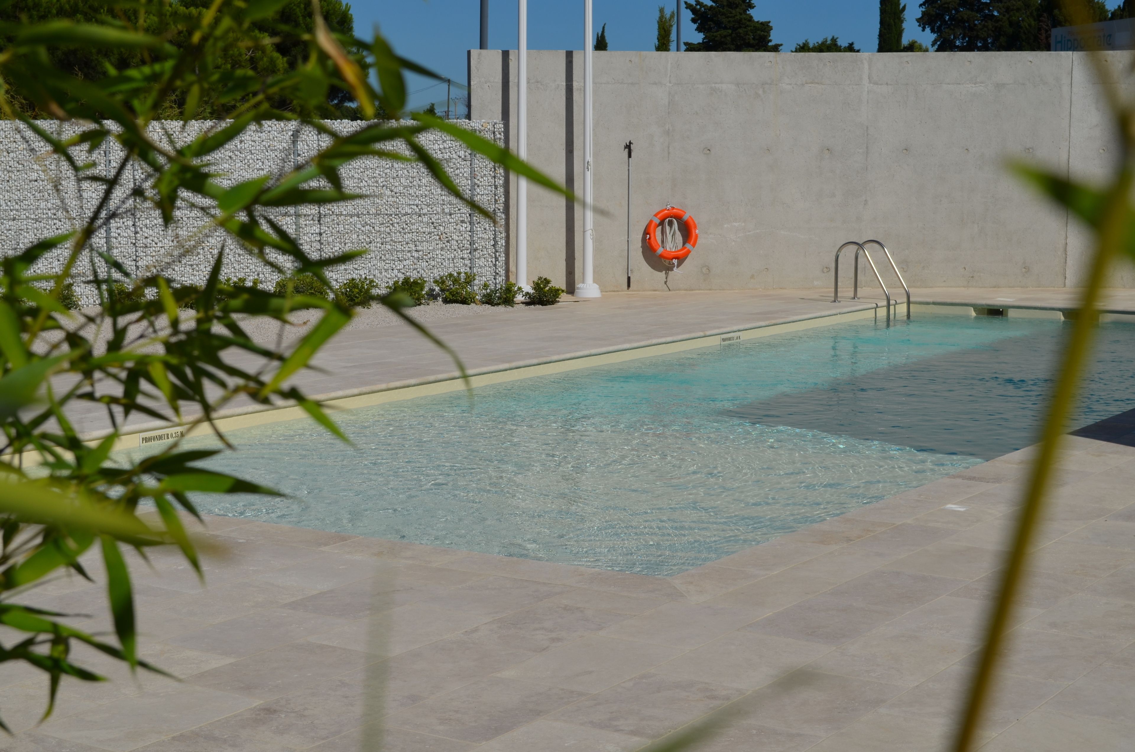 seasonal outdoor pool, open 9:30 am to 10:00 pm, pool loungers