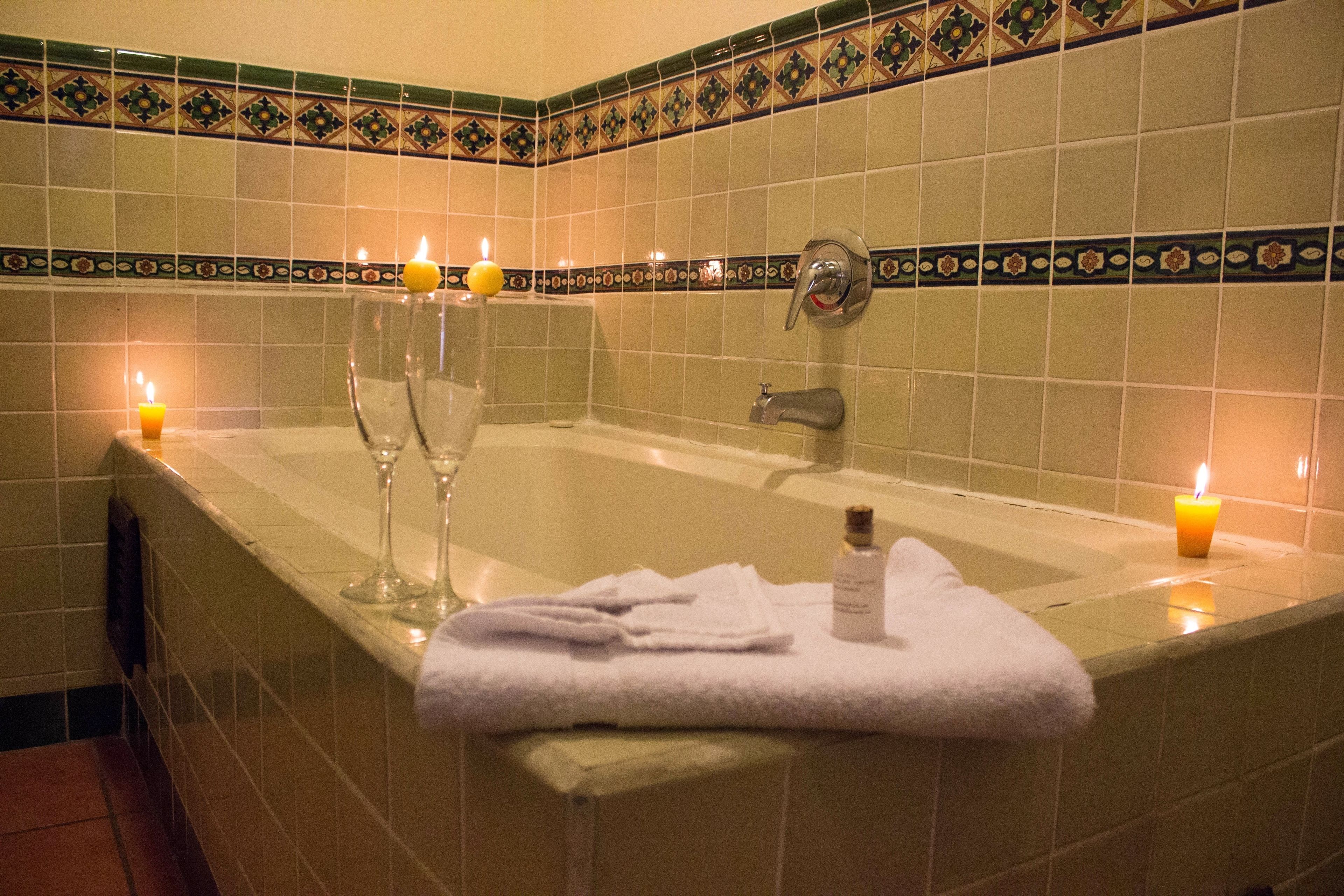 superior suite, jetted tub, courtyard area | deep-soaking bathtub