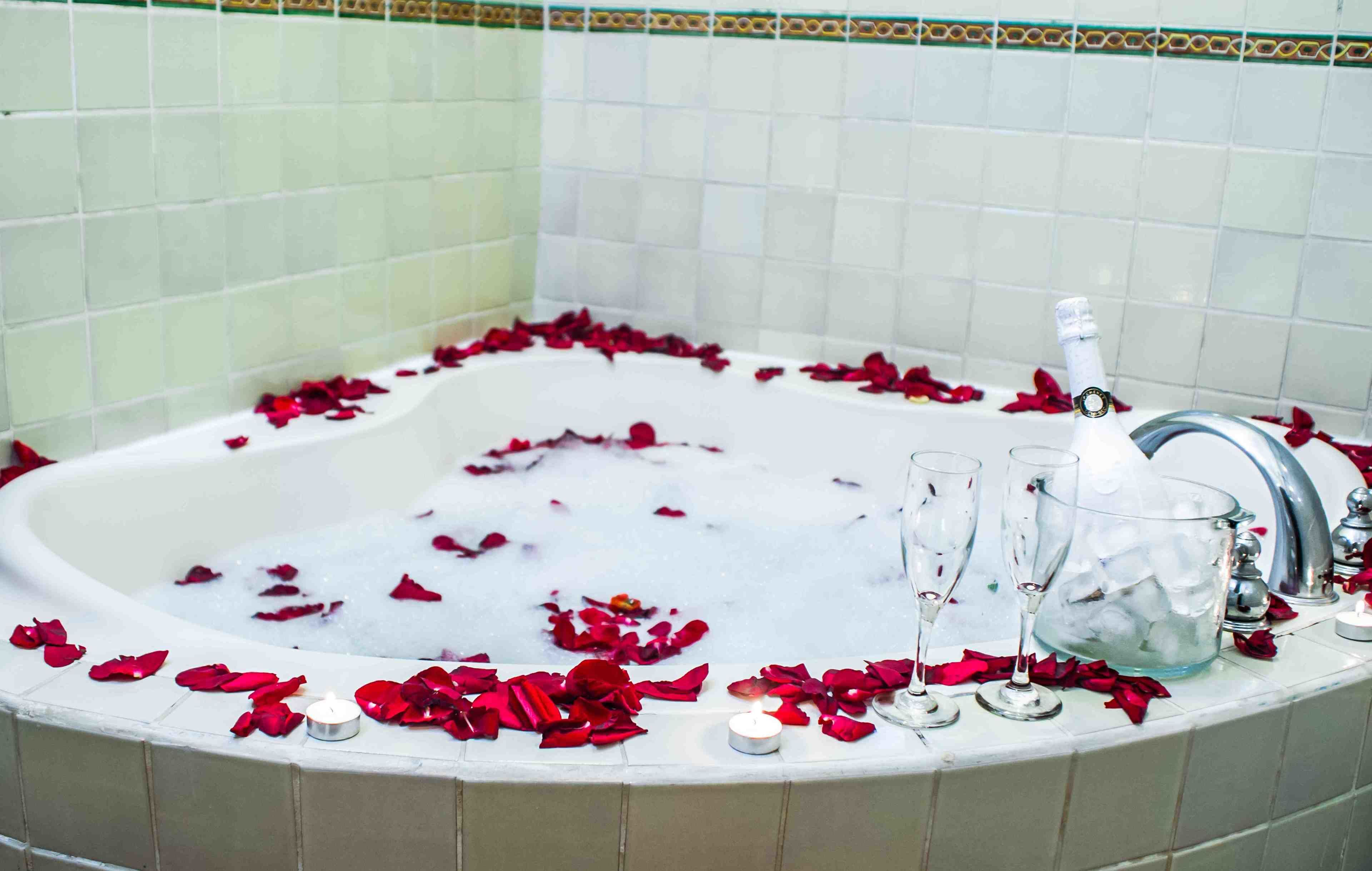 superior suite, jetted tub, courtyard area | bathroom | free toiletries, hair dryer, towels, soap