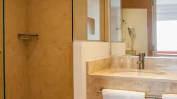 Shower, free toiletries, hair dryer, towels