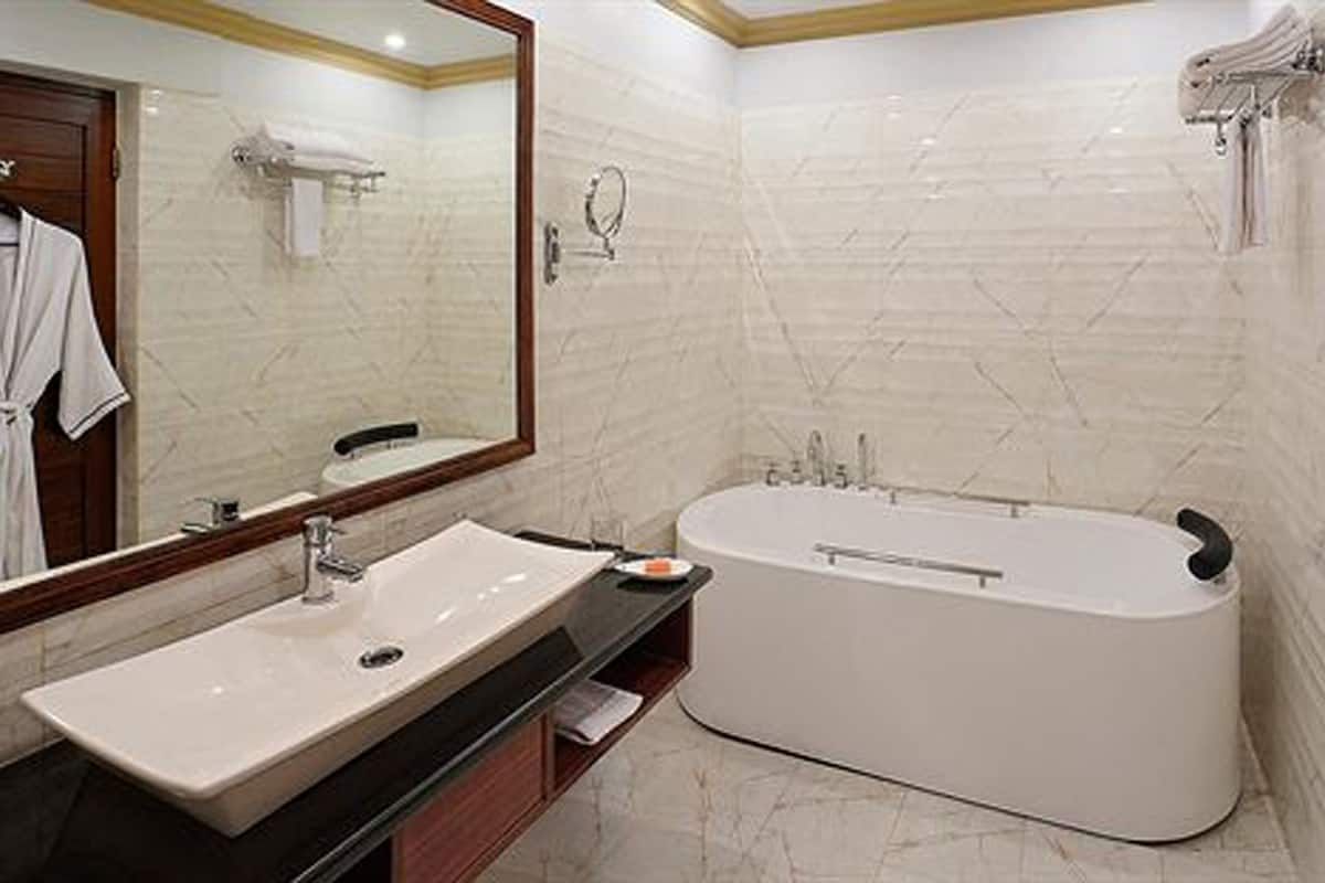 hair dryer, bathrobes, slippers, towels