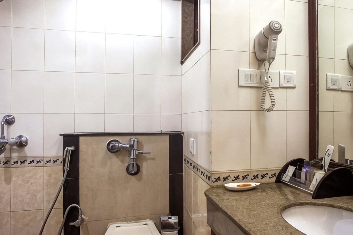 Bathroom | Hair dryer, bathrobes, slippers, towels