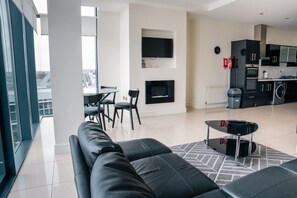 Standard Apartment, 2 Bedrooms | Living area | 40-inch TV with cable channels - Citypoint Apartments (Galway)