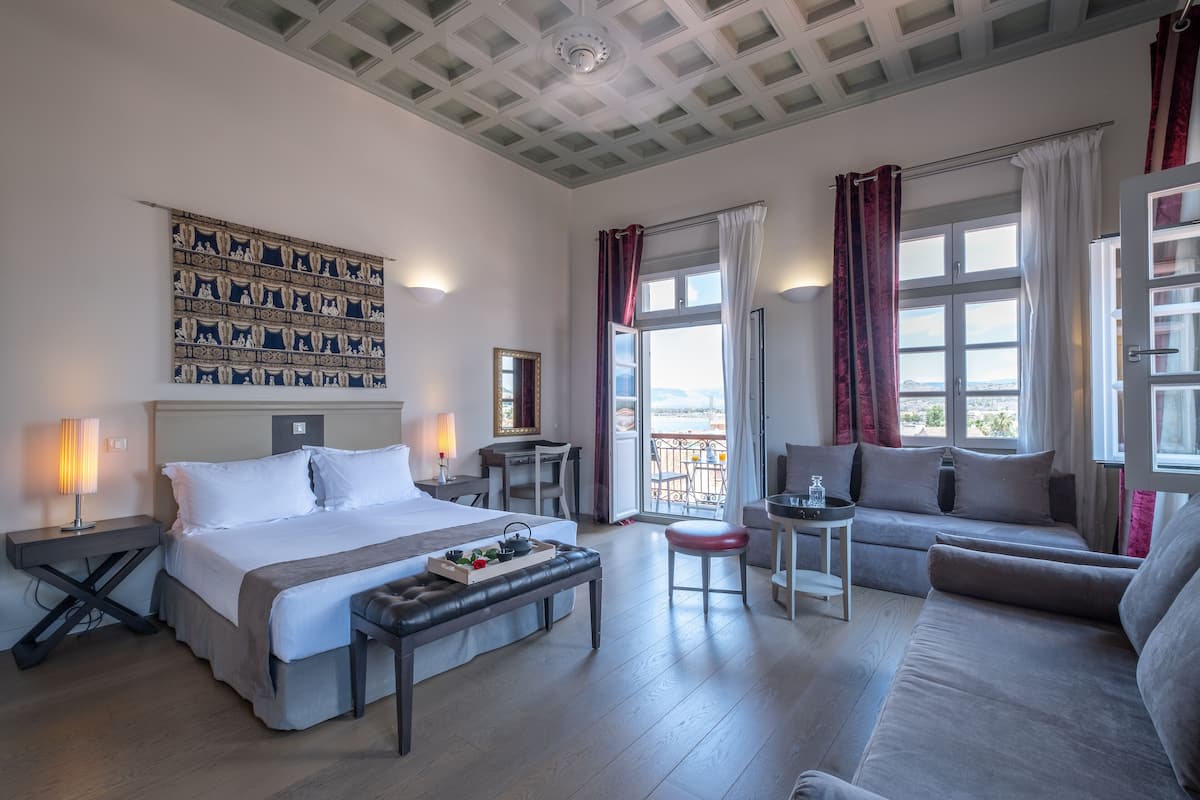 Executive Suite with Sea View | Premium bedding, free minibar, in-room safe, laptop workspace