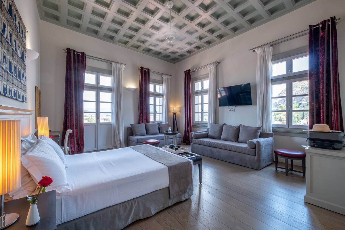 executive suite with sea view | premium bedding, free minibar, in-room safe, laptop workspace