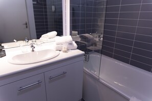 Eco-friendly toiletries, hair dryer, towels, soap
