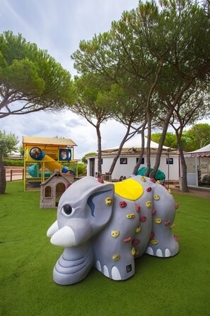 Children's play area - outdoor - Camping Village Baia Blu La Tortuga (Aglientu)