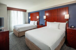 Premium bedding, desk, laptop workspace, iron/ironing board