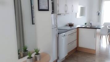 Apartment, 2 Bedrooms (EXCL. SHEETS, TYPE 4+2) | Private kitchen | Fridge, microwave, stovetop, coffee/tea maker