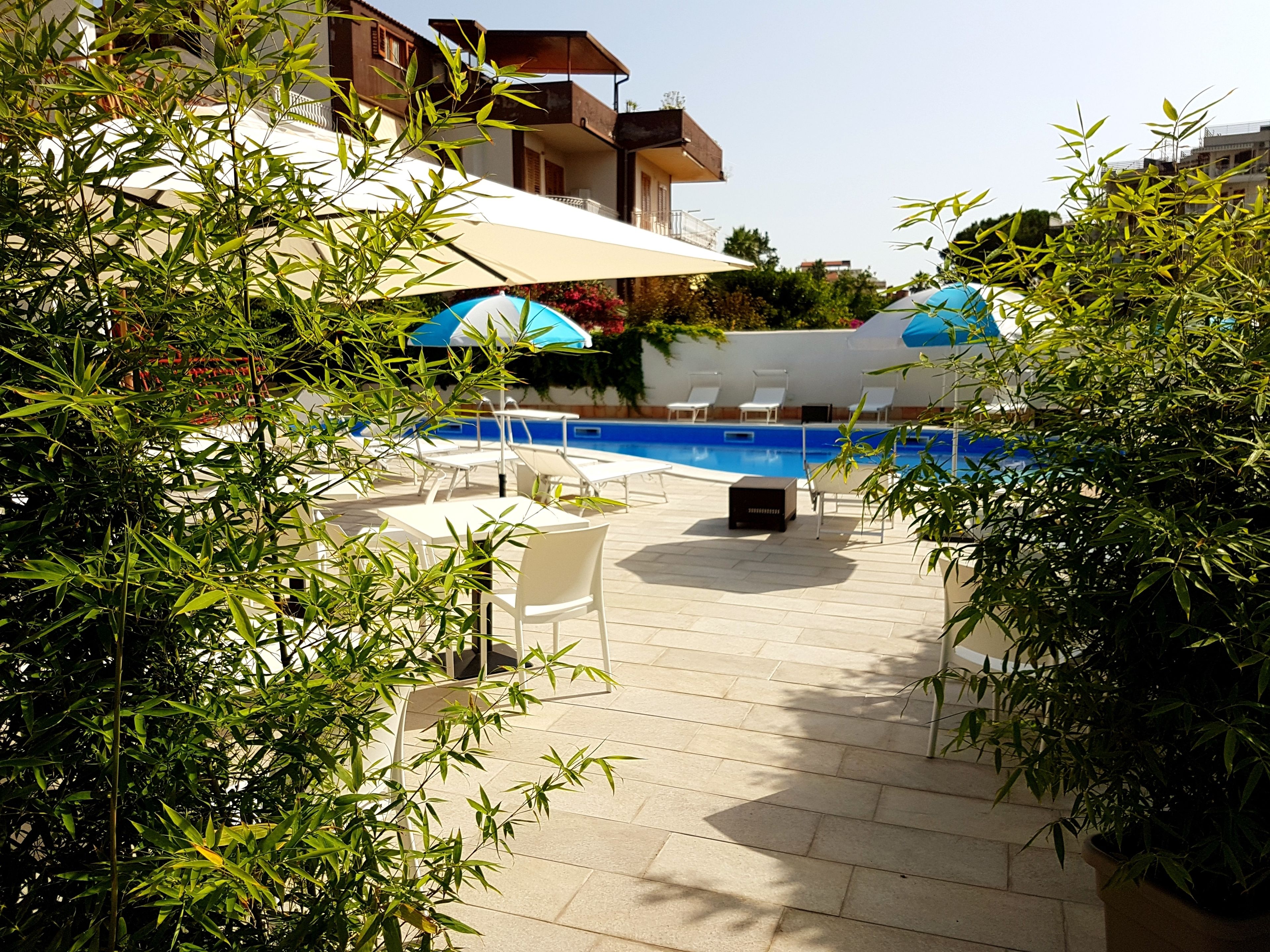 seasonal outdoor pool, open 9:30 am to 7:00 pm, pool loungers