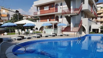 Seasonal outdoor pool, open 9:30 AM to 7:00 PM, sun loungers