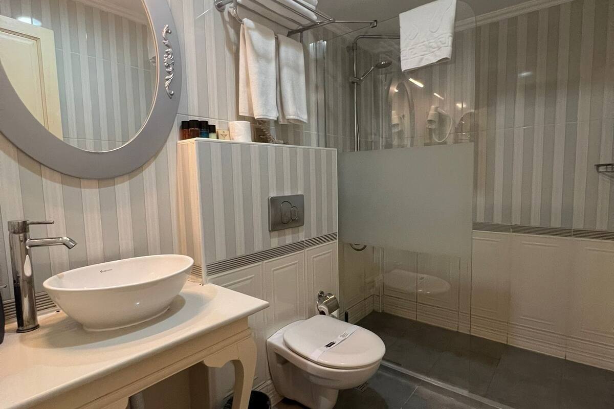 shower, rainfall showerhead, designer toiletries, hair dryer