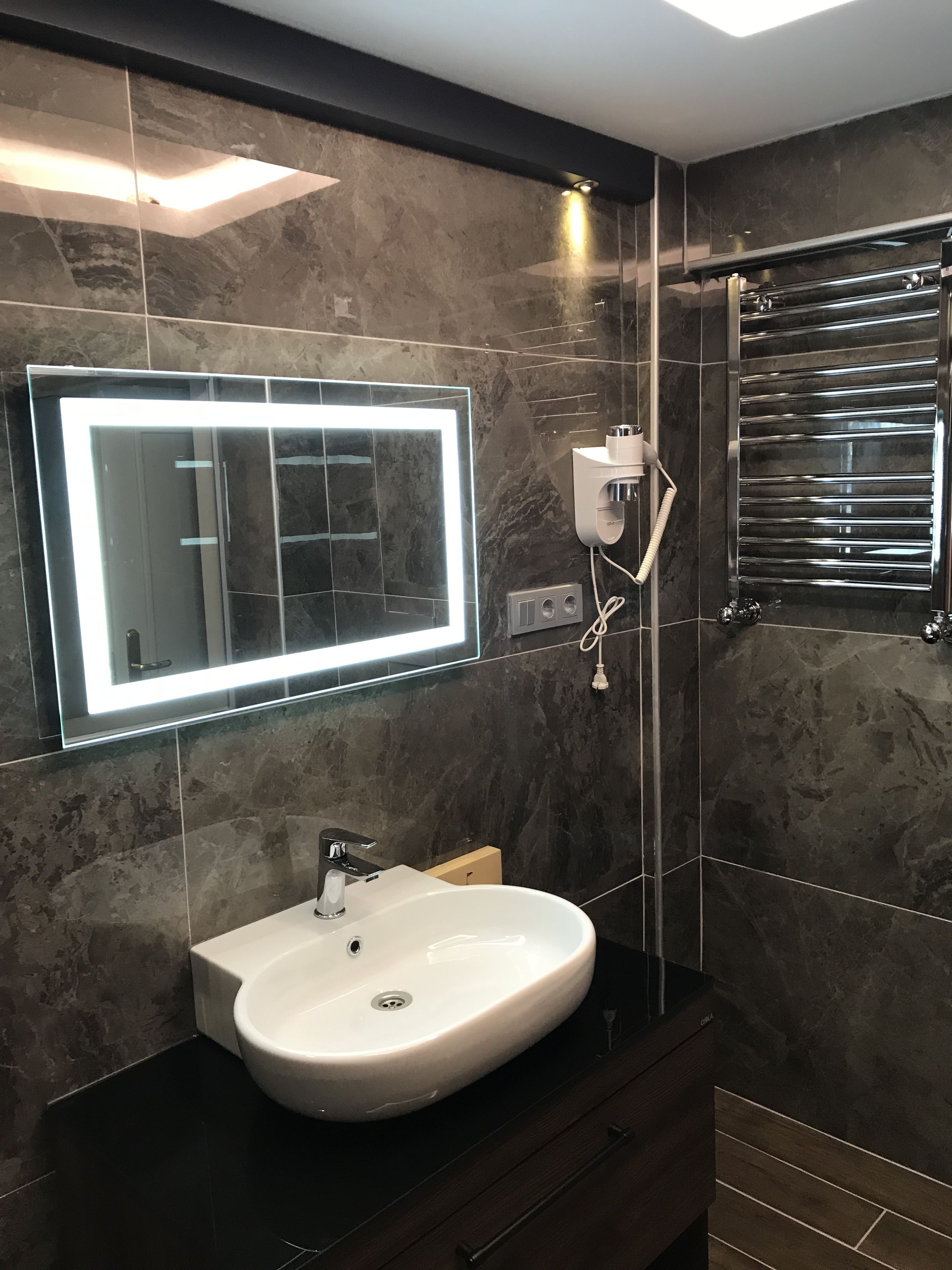 economy room, 1 queen bed with sofa bed (basement room) | bathroom | shower, rainfall showerhead, designer toiletries, hair dryer